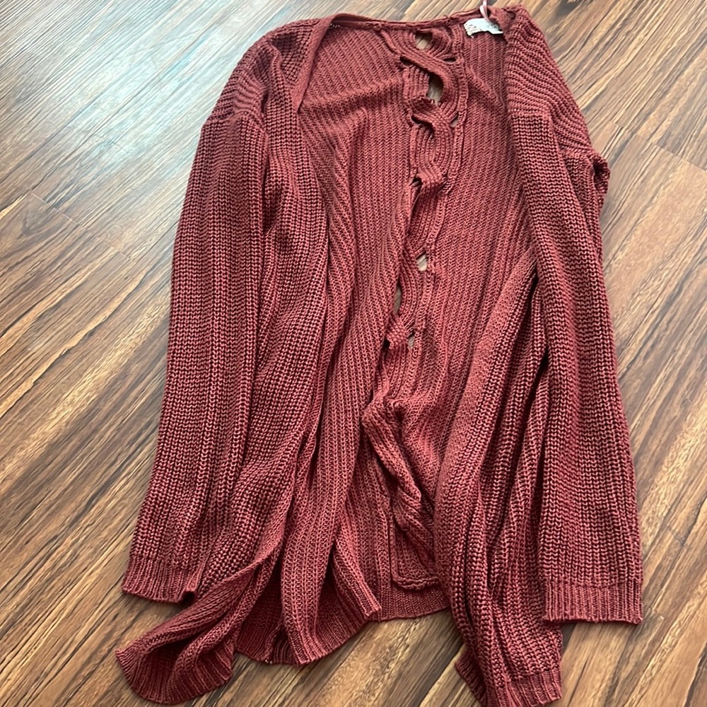red/maroon cardigan with cool design in the back. great for a casual outfit
